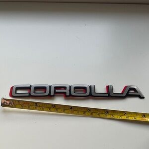 Silver Toyota Corolla Car emblem Spell out Thin 8”